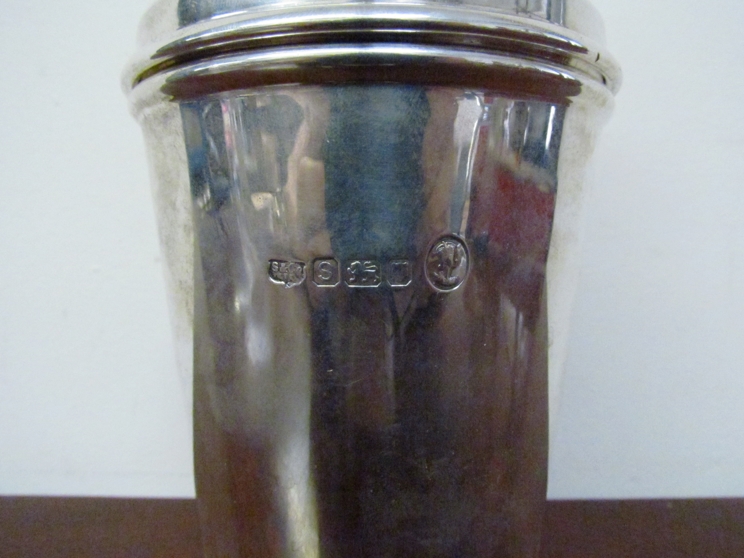 A silver cocktail shaker by Searle & Co, London 1953, 20cm tall, - Image 2 of 2