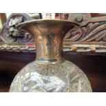 A silver collared crystal glass decanter,