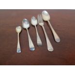 A silver christening spoon and fork, two teaspoons and a salt spoon,