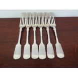 A set of six Josiah Williams and Co silver forks, London 1937, monogrammed handles,