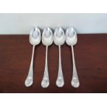 A set of four James Dixon and Sons Ltd silver spoons with shell form handles, Sheffield 1892,