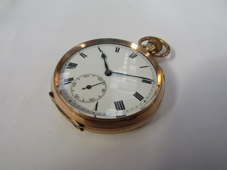 A 9ct gold open faced pocket watch with engine turned case back,