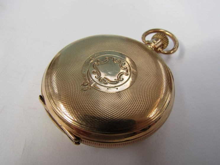 A 9ct gold open faced pocket watch with engine turned case back, - Image 2 of 2