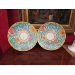 A pair of Charlotte Rhead by Crown Ducal plates/chargers,