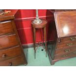 A pair of Edwardian mahogany jardiniere stands the raised gallery circular top over fine square