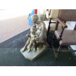 A late 19th Century painted plaster sculpture of naked mother and child, unsigned.