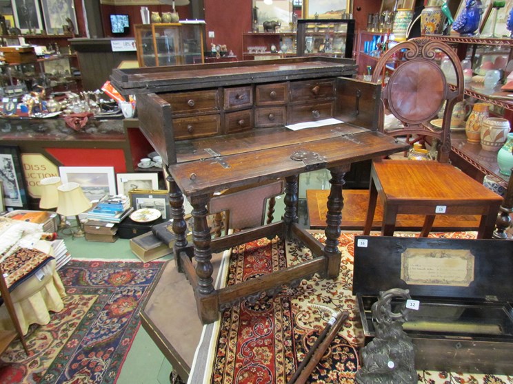 A 17th Century Italian walnut and yew enclosed writing desk,