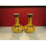 A pair of Elves Ware vases by Wood and Sons, Burslem, yellow ground with Art Nouveau green,