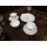 A Royal Doulton Monteigne pattern six place setting, cups, saucers,