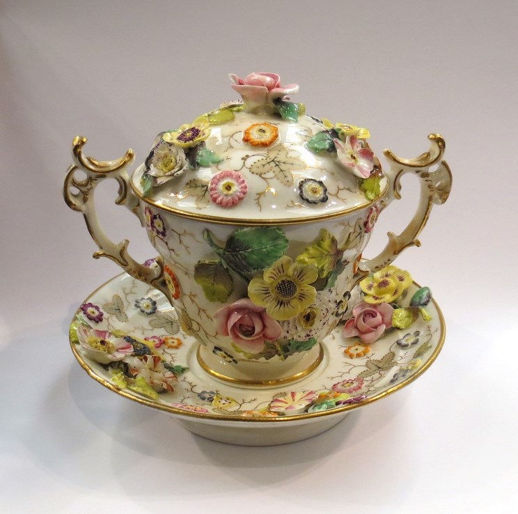 A late 18th Century English porcelain, lidded cup, saucer,