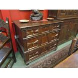 An oak chest of drawers, circa 1700, geometrically moulded front drawers, chest in two pieces,