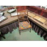 An Edwardian mahogany bedroom chair, satinwood marquetry back, spindle supports,