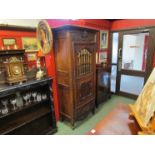 A 19th Century Continental walnut food cupboard with carved embellishment 193cm x 89cm