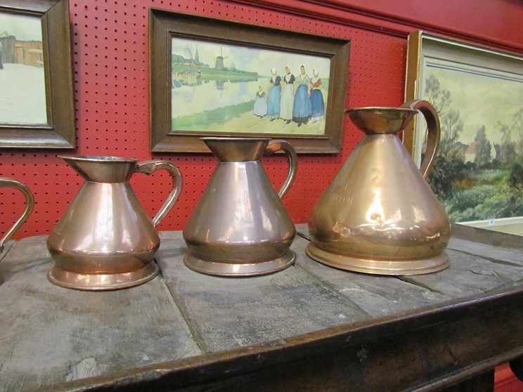 A set of six graduating copper measuring jugs - Image 2 of 2