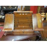 A Partridge & Cozens of London burr walnut stationery desk stand with date cards