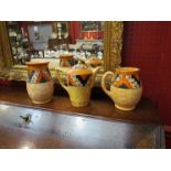 Three Charlotte Rhead by Crown Ducal pottery pieces consisting of vase, jug and coffee pot,