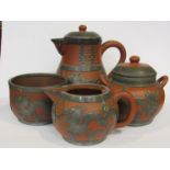 Four Chinese Yixing and pewter items by Hor Chung Weihaiwei consisting of saucer,milk jug,