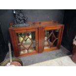 A late Victorian walnut table top apothecary cabinet the two astragal glazed bevel edge doors