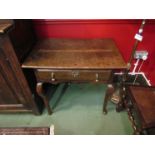 A George II oak side table, single drawer,