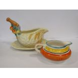 A Clarice Cliff basket ware sauce jug with dish,