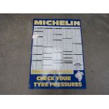 A Michelin Tyre Pressure tin sign chart