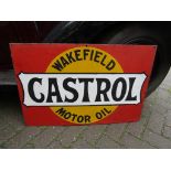 An enamel sign "Wakefield Castrol Motor Oil"