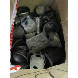 A box of mixed cycle lamp cases and parts