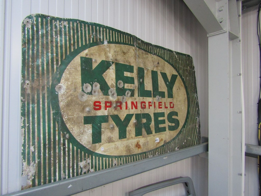 Kelly Tyres tin sign a/f