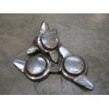 A set of four chrome spinners