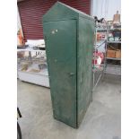 A Castrol oil cabinet with key