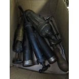 A box of mixed grease guns etc