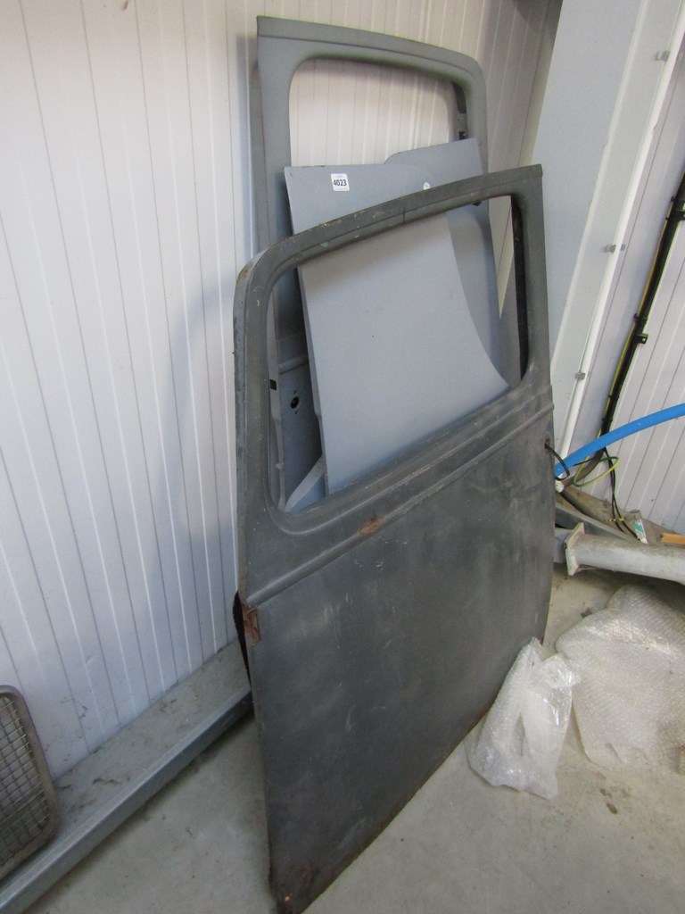 Four vintage car doors including Austin 7 and an Austin 7 boot lid