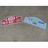 Two signs 'Coupe Des Alpes' and 'Rallye Monte Carlo'