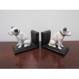 A pair of cast metal book ends in the form of Nipper the HMV terrier dog,
