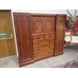 A 19th Century mahogany compactum wardrobe,