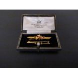 A 15ct gold bar brooch and diamond and pearl bar brooch