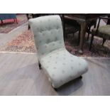 A Victorian nursing chair with scroll ends modern upholstery