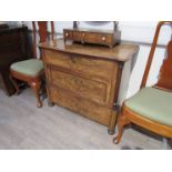 A 19th Century mahogany French commode with three drawers,