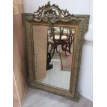 An ornate French over mantel mirror 123cm x 81cm