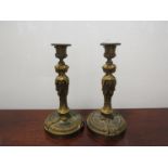 A pair of Victorian gilt figural candlesticks,
