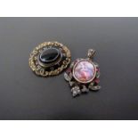 A Victorian memoriam brooch and seed pearl encrusted pendant with central ceramic panel (2)