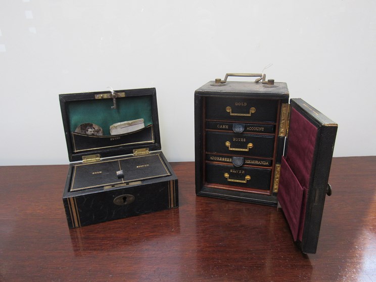 A Bagshaw and Sons Liverpool leather bound miniature safe,