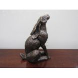 A resin bronze moongazing hare,