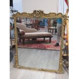 A 19th Century Rococo wall mirror with acanthus and scroll detail,