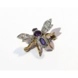 A gold brooch/ pendant as a bee set with diamonds and amethyst