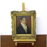 A late 18th early 19th Century portrait of a gentleman oil on board, split.