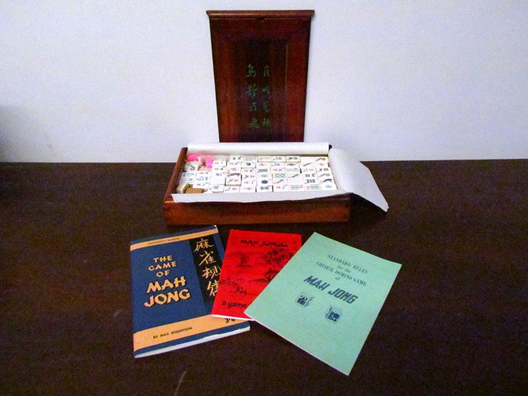 A 20th Century mahjong set in wooden case with instructions
