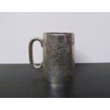 A Hilliard & Thomason silver christening mug with central inscribed presentation cartouche,