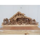 A Black Forest carved nativity scene, approximately 50 pieces,