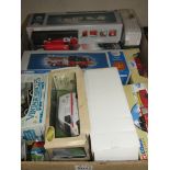 A box of boxed emergency service models including Corgi